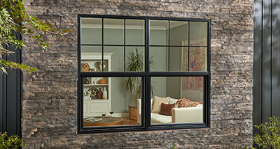 Home exterior with West pro Series 200 windows featuring single hung windows